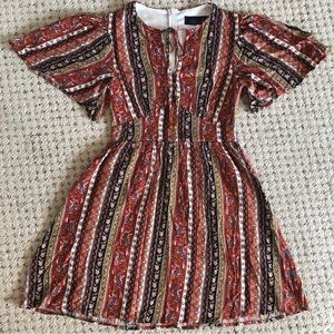 Francesca’s floral pattern dress with fitted waist. Size XS. New with tag.